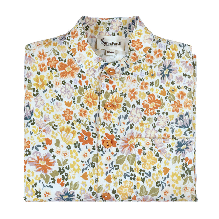 Kidnerbluse Blumen gefaltet